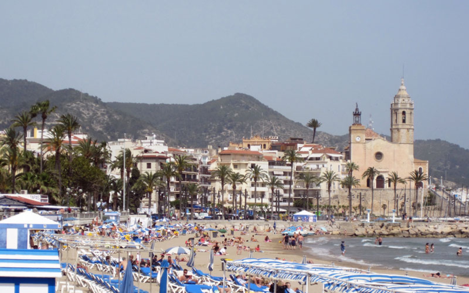 Sitges beach with the church on the promontory